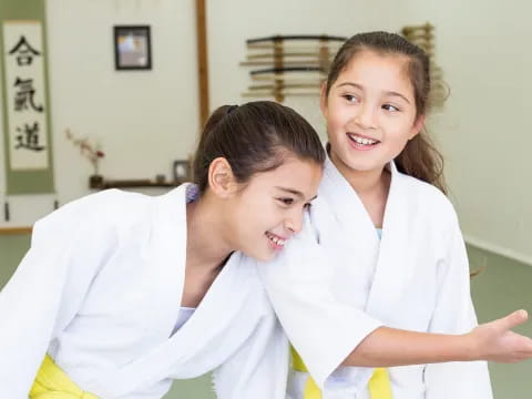 a person holding a girl