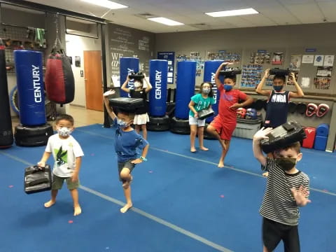 a group of kids in a gym