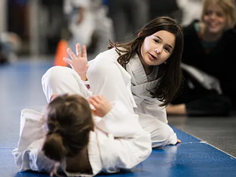 a woman holding a child