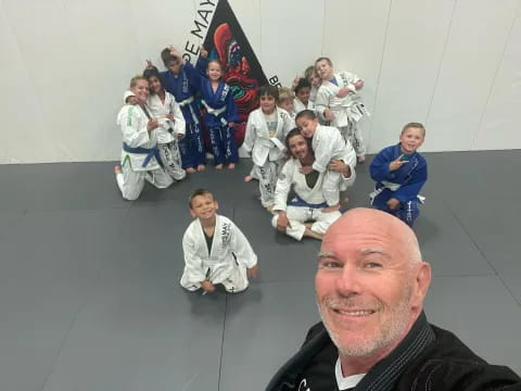 a group of people in white robes