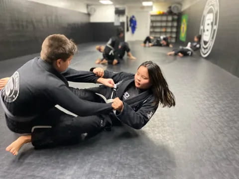 a man and a woman in a gym