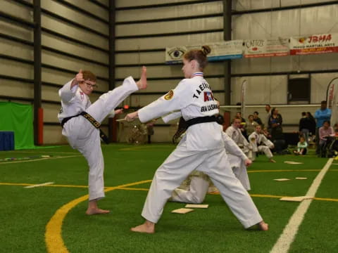 two people in karate uniforms