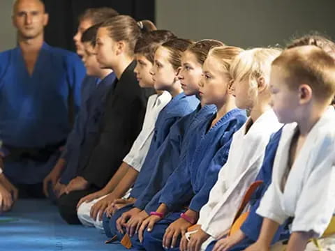 a group of children in uniform