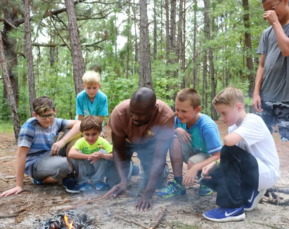 a group of people in the woods