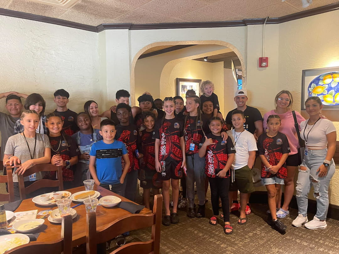 a group of people posing for a photo