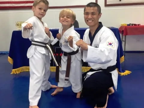 a group of people in karate uniforms