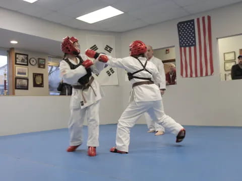 two people in white uniforms