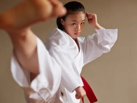 a person in a karate uniform