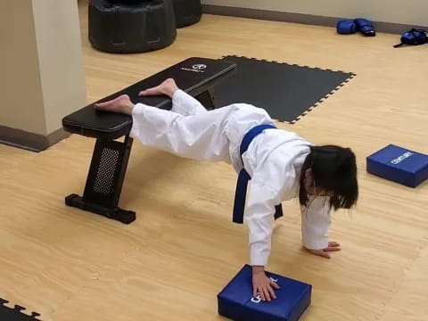 a person doing yoga on a mat