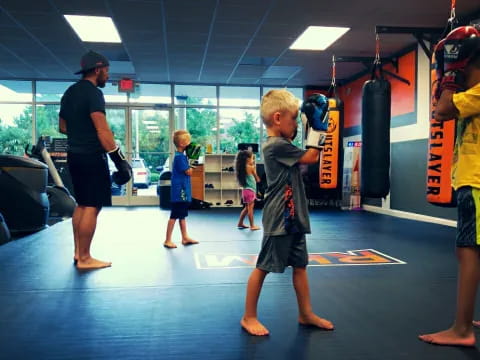 a group of people in a gym