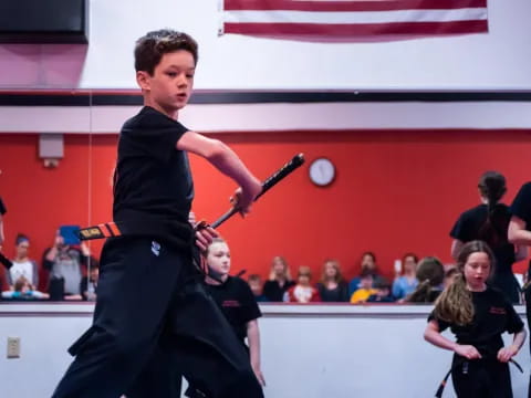 a boy in a black shirt
