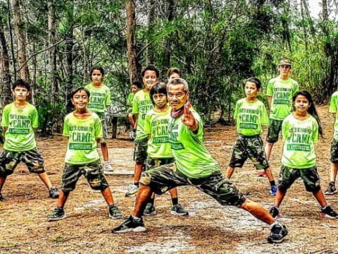 a group of kids playing football