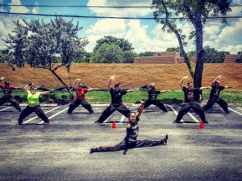 a group of people jumping in the air