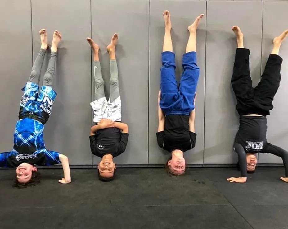 a group of people doing yoga