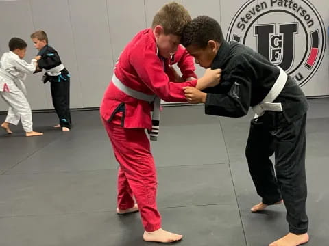 a group of people in martial arts uniforms