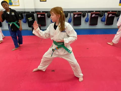 a person in a karate uniform