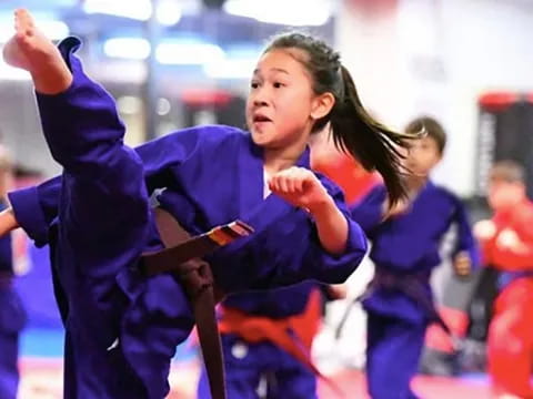a girl in a blue dress