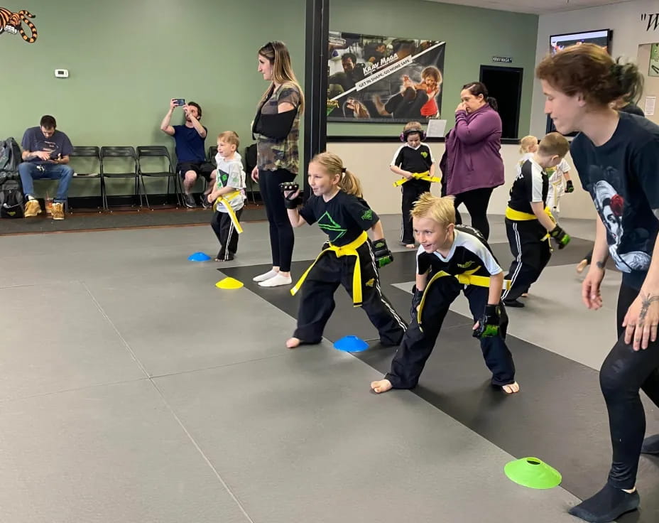 a group of kids playing with balls