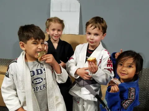 a group of kids eating ice cream