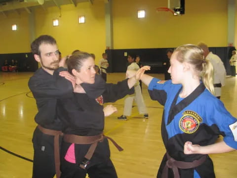 a group of people in a gym