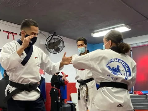 a group of people wearing masks