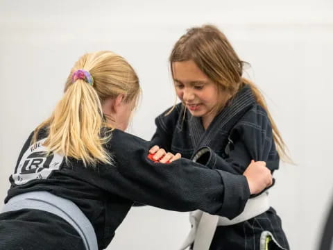 a couple of girls hugging