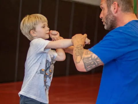 a man holding a baby