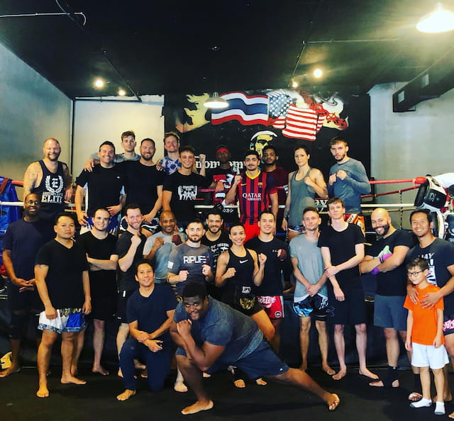 a group of people posing for a photo