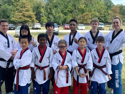 a group of people wearing medals