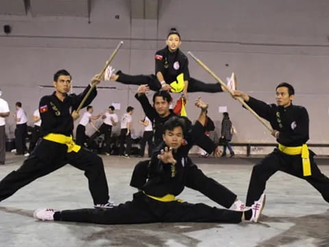 a group of people in a gym