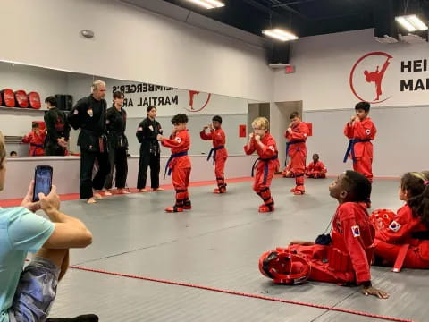 a group of people in a gym