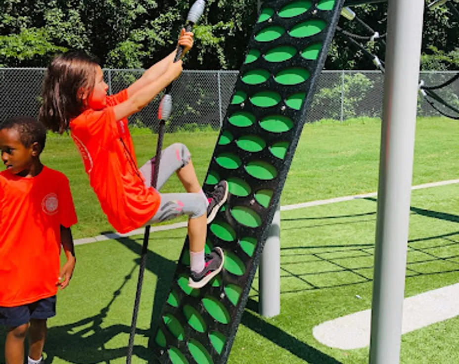 kids playing on a swing set