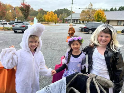 a group of girls wearing clothing