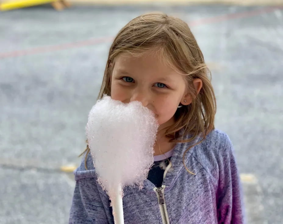 a girl holding a snowball