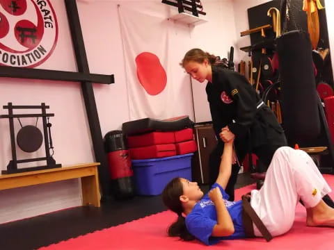 a man and a woman doing yoga