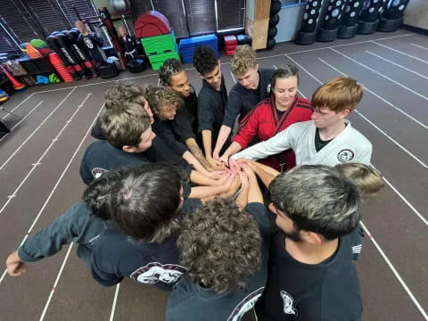 a group of people sitting on the floor