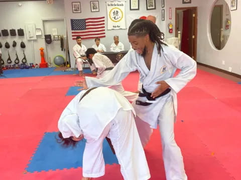 a person in a karate uniform