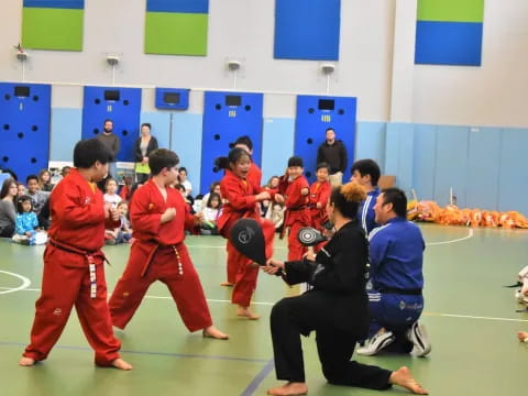 a group of people in a gym