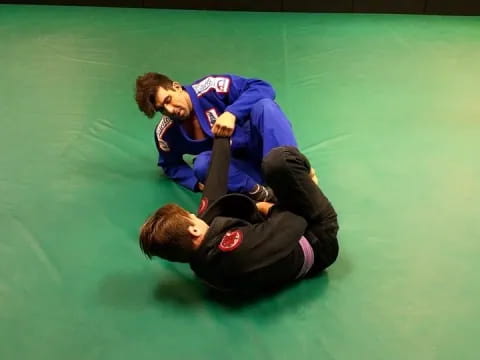 two men lying on the floor