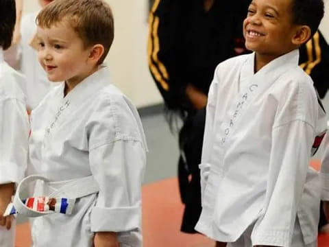 a boy wearing a white shirt