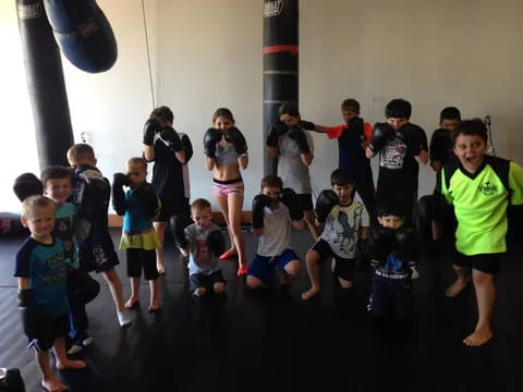 a group of people in a gym