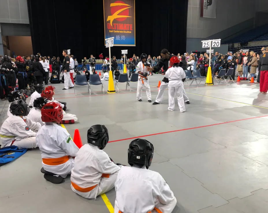 a group of people in white uniforms