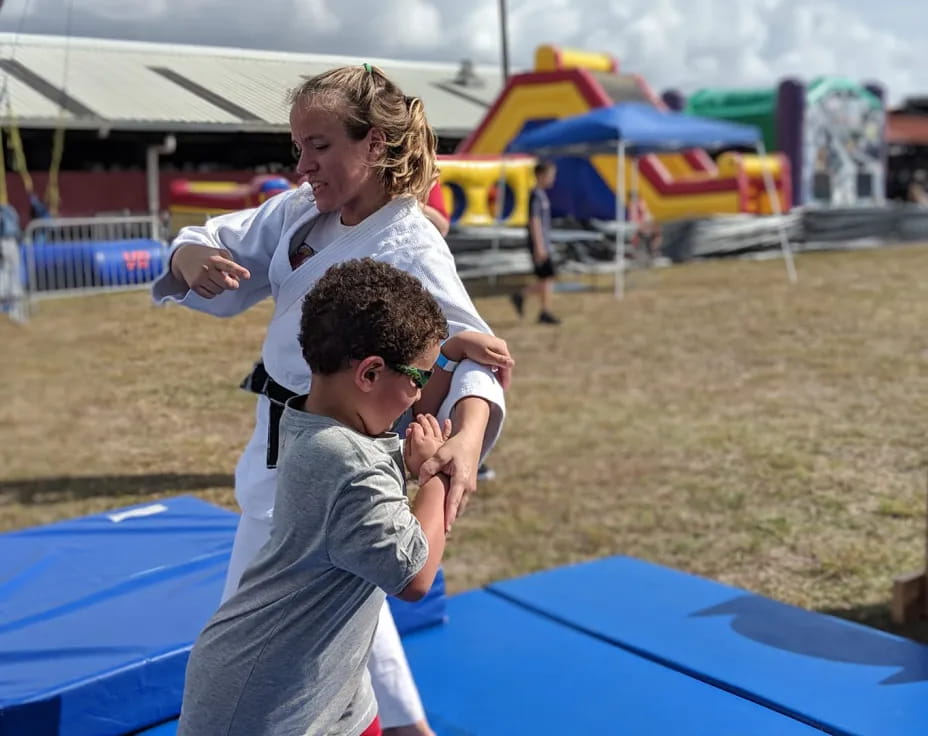 a person holding a boy