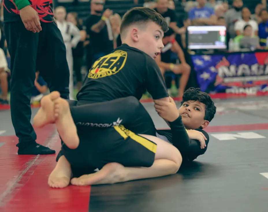 a person holding another man