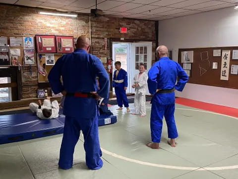 a few men in blue uniforms