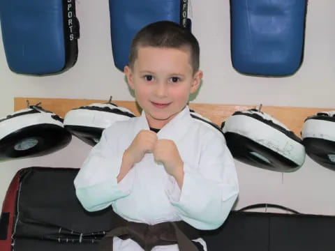 a boy sitting at a desk