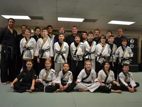 a group of people wearing medals