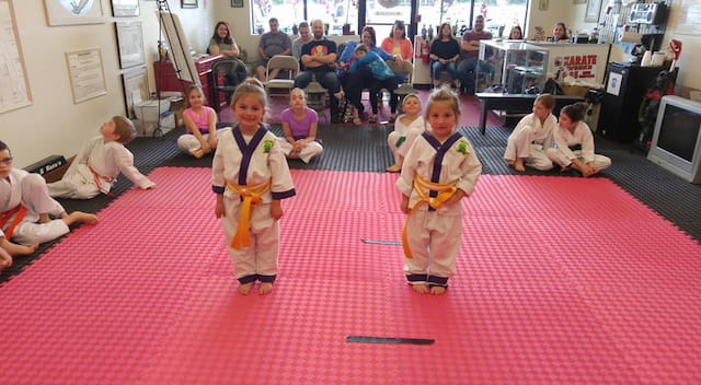 children in karate uniforms