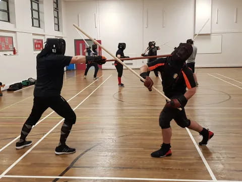 a group of people playing a sport