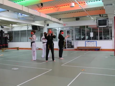 a group of people in a gym